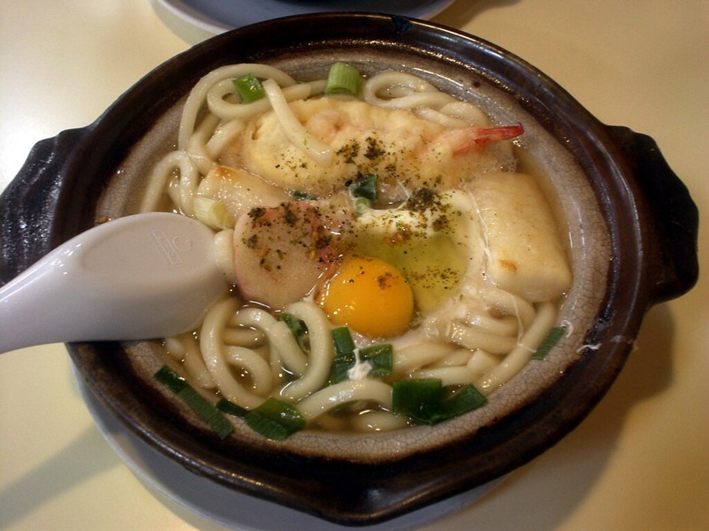 Nabeyaki udon cooked in a clay donabe at Nishiki Market, Kyoto
