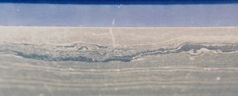 Layered Japanese steel showing the visible grain pattern of folded construction