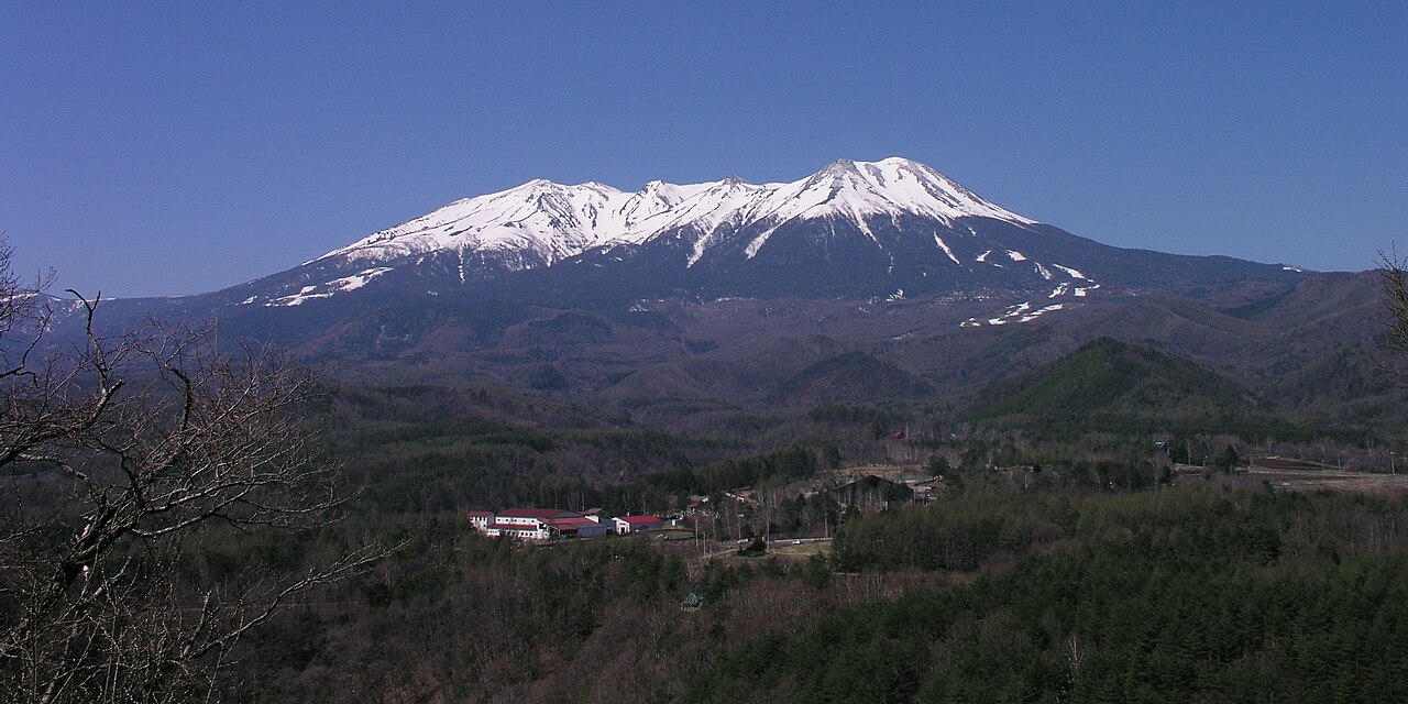 Mount Ontake, a high sacred peak rising above the forested Kiso region