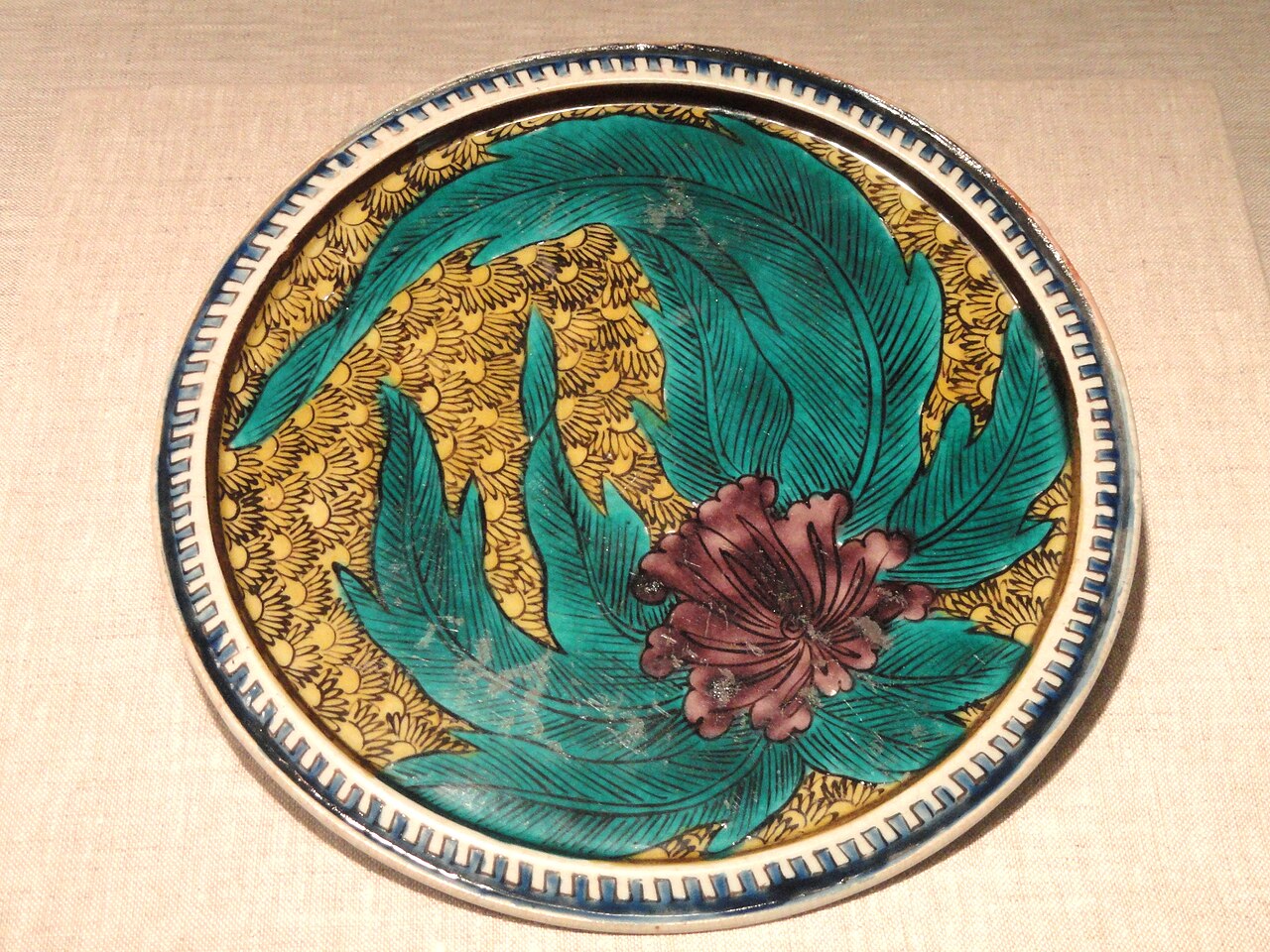 Late 17th-century Kutani porcelain plate with thick five-color overglaze enamel decoration