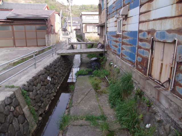 A river running through the town of Aikawa on Sado Island