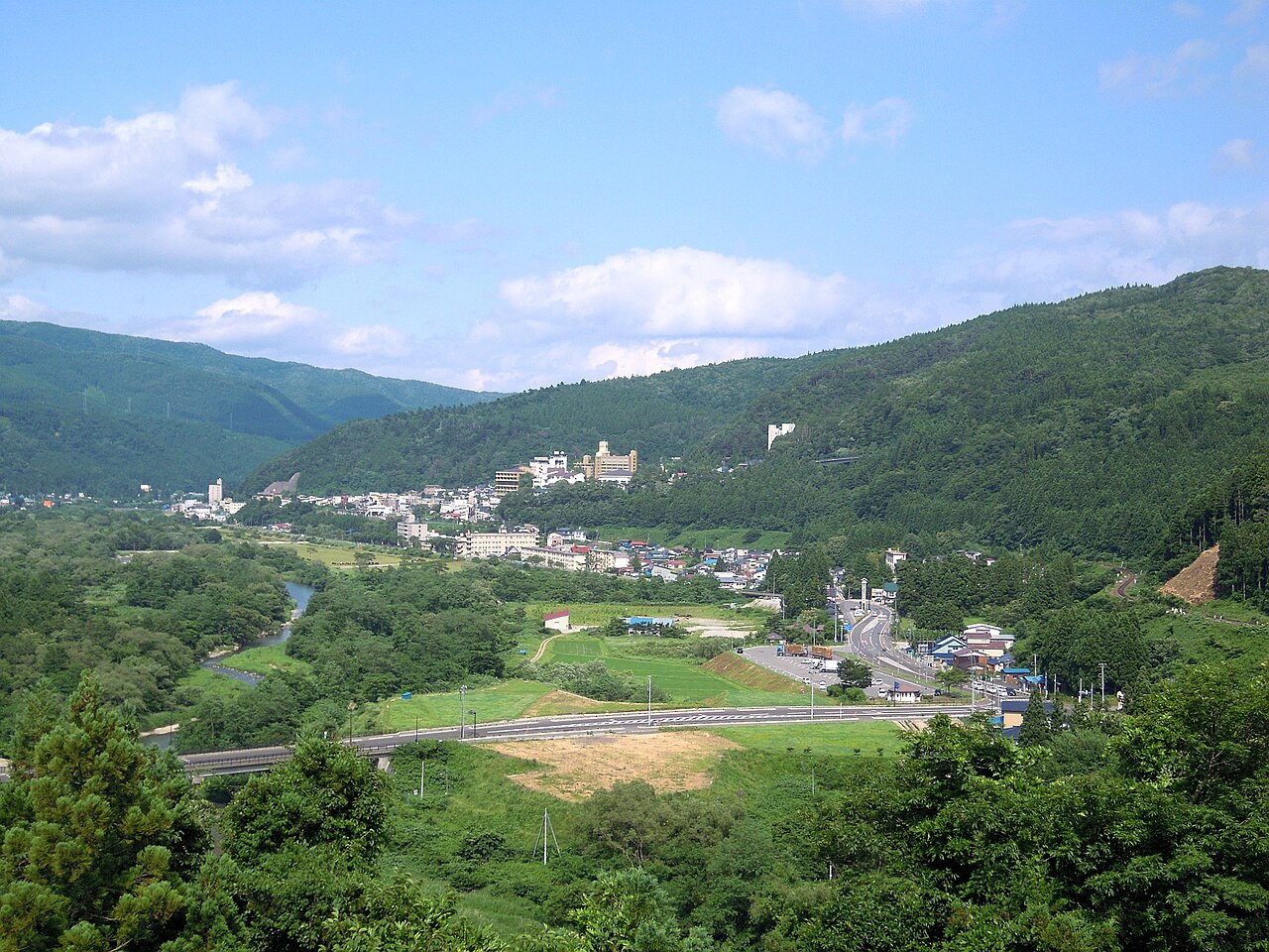 Distant view of Naruko Onsen hot-spring town nestled in the Miyagi mountains