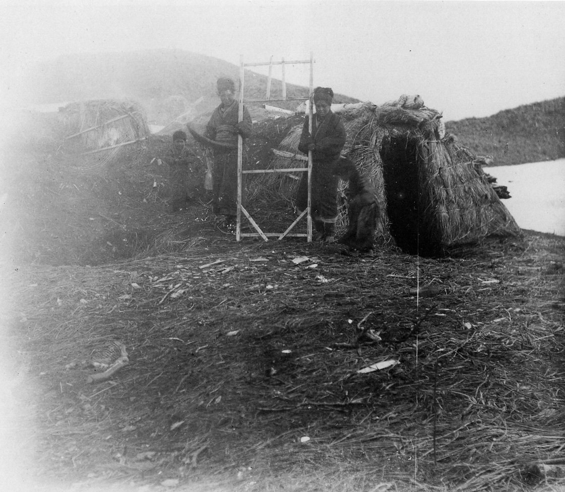 A traditional Ainu chise dwelling photographed in 1899
