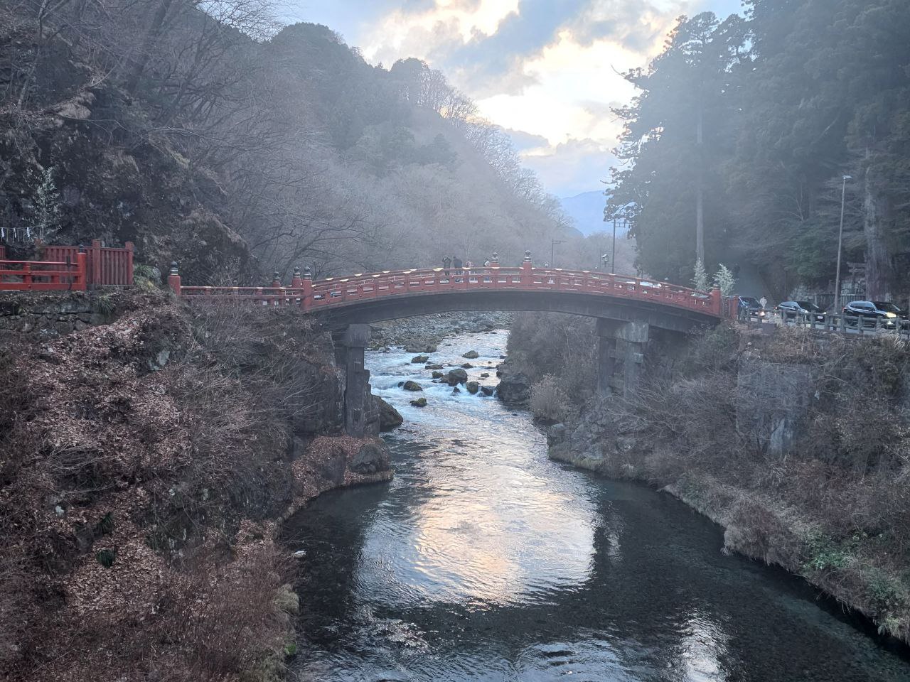 The vermilion Shinkyo bridge at the entrance to Nikko in winter