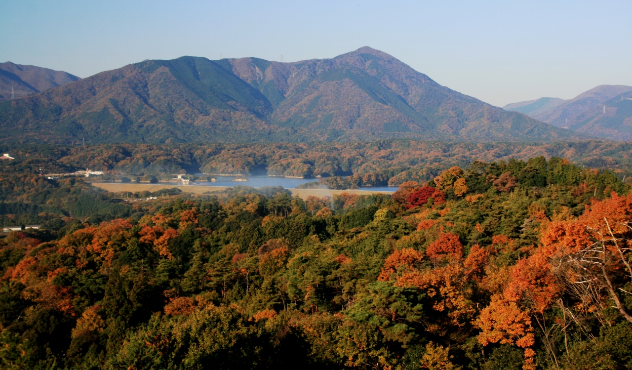 Eboshidake peak in the Suzuka Mountains above a reservoir