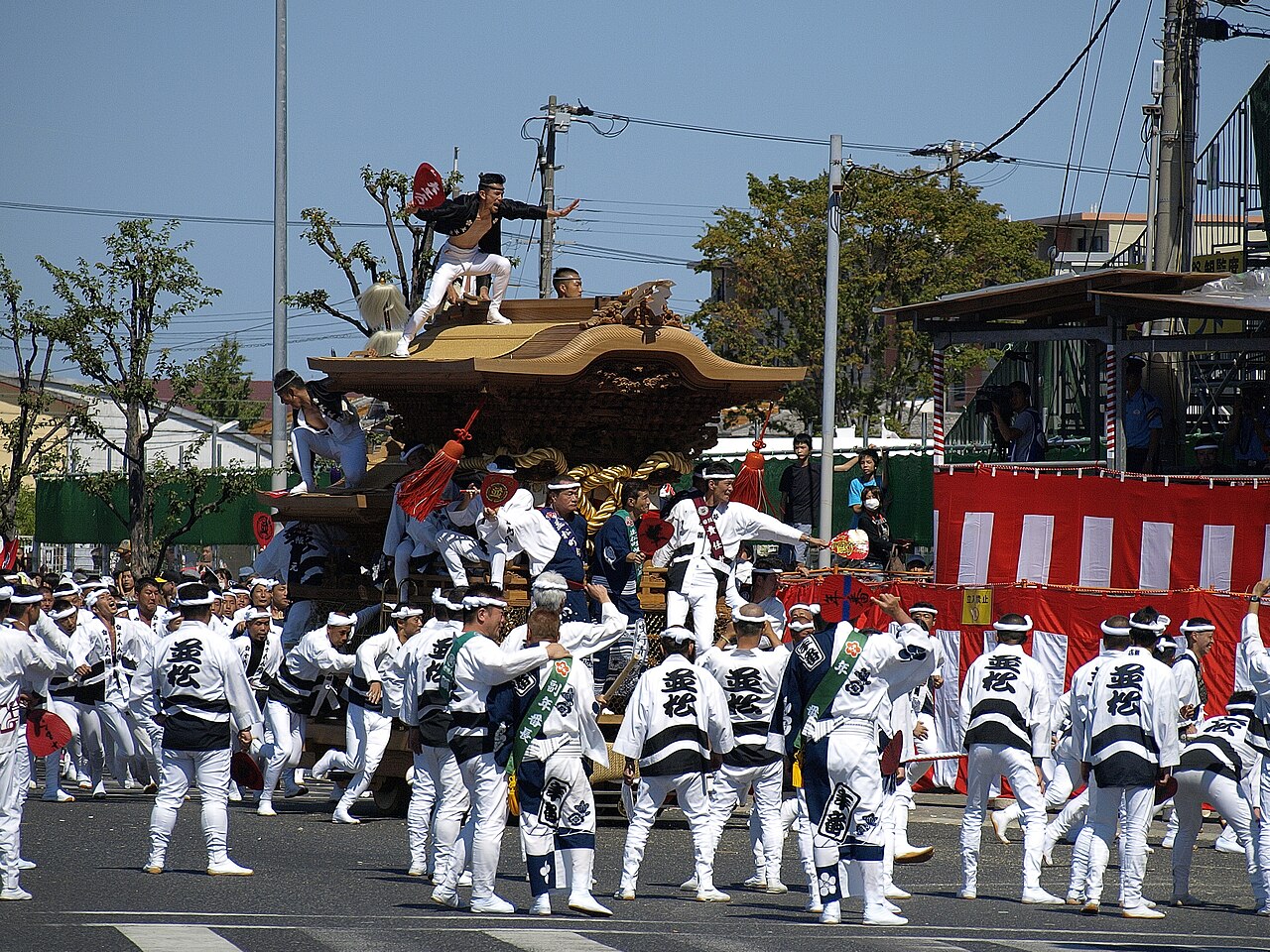 The Kishiwada Danjiri Matsuri, with a large wooden float being pulled through Osaka streets