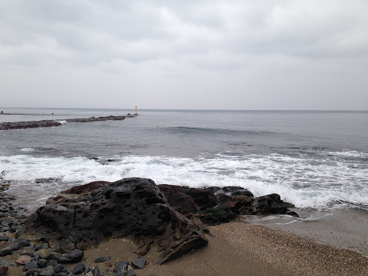 Amaharashi Coast in Toyama with the Tateyama range in the distance