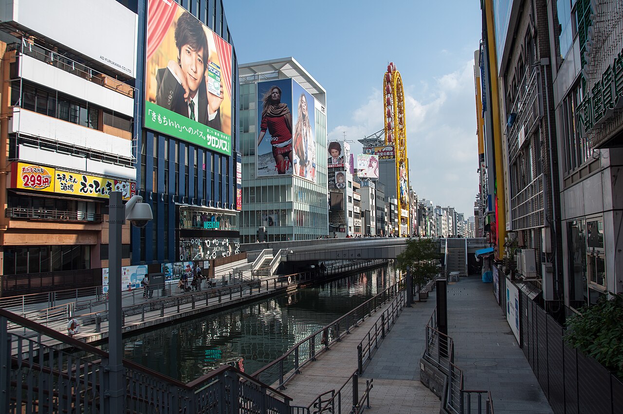 The dense neon commerce of Dotonbori street in Osaka at night
