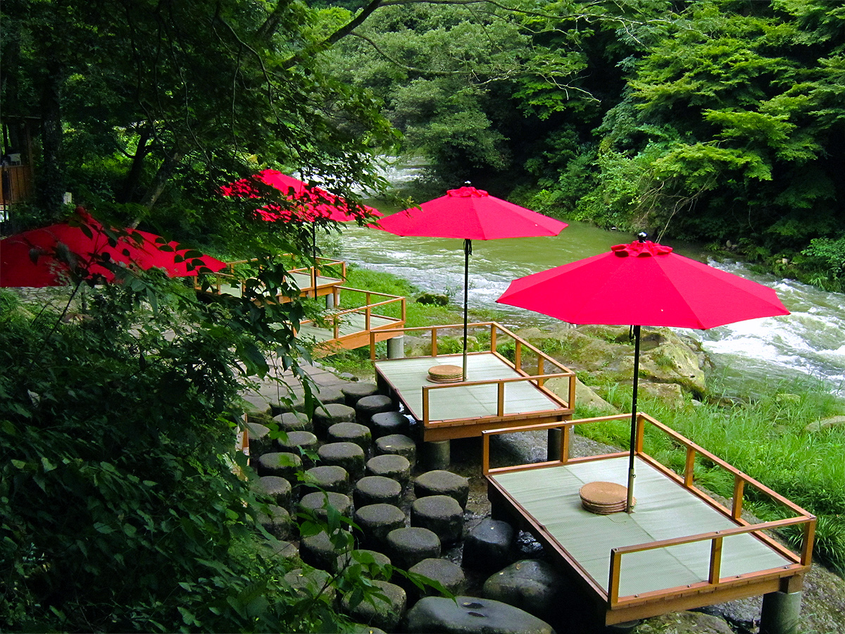The Kakusenkei gorge along the Daishoji River near Yamanaka Onsen, surrounded by hardwood forest