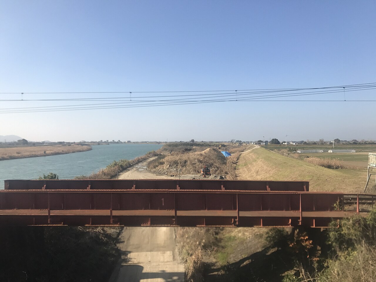 The Midorikawa river in Kumamoto seen from the Misumi Line train