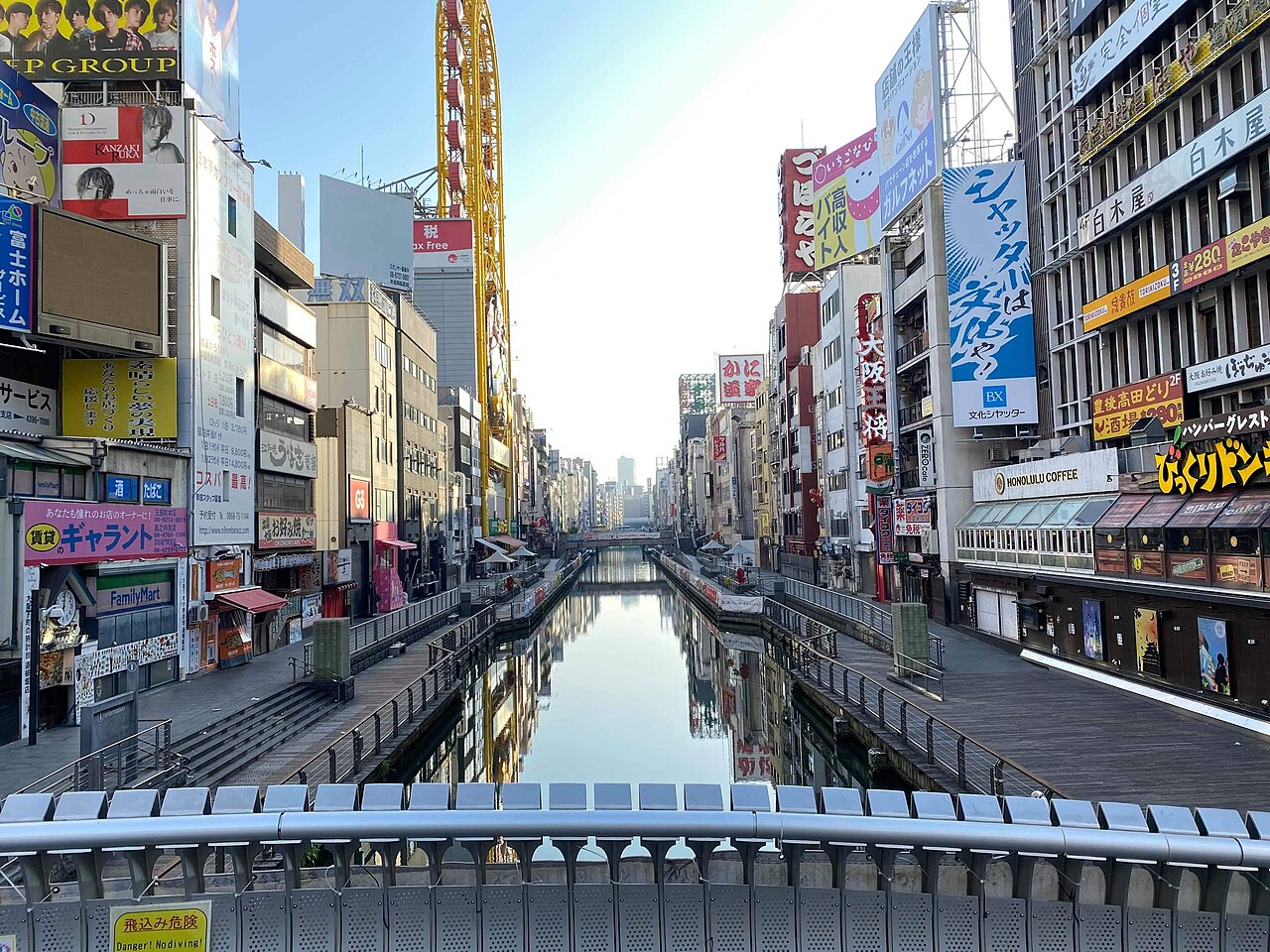 Dotonbori canal in central Osaka lined with signs and buildings