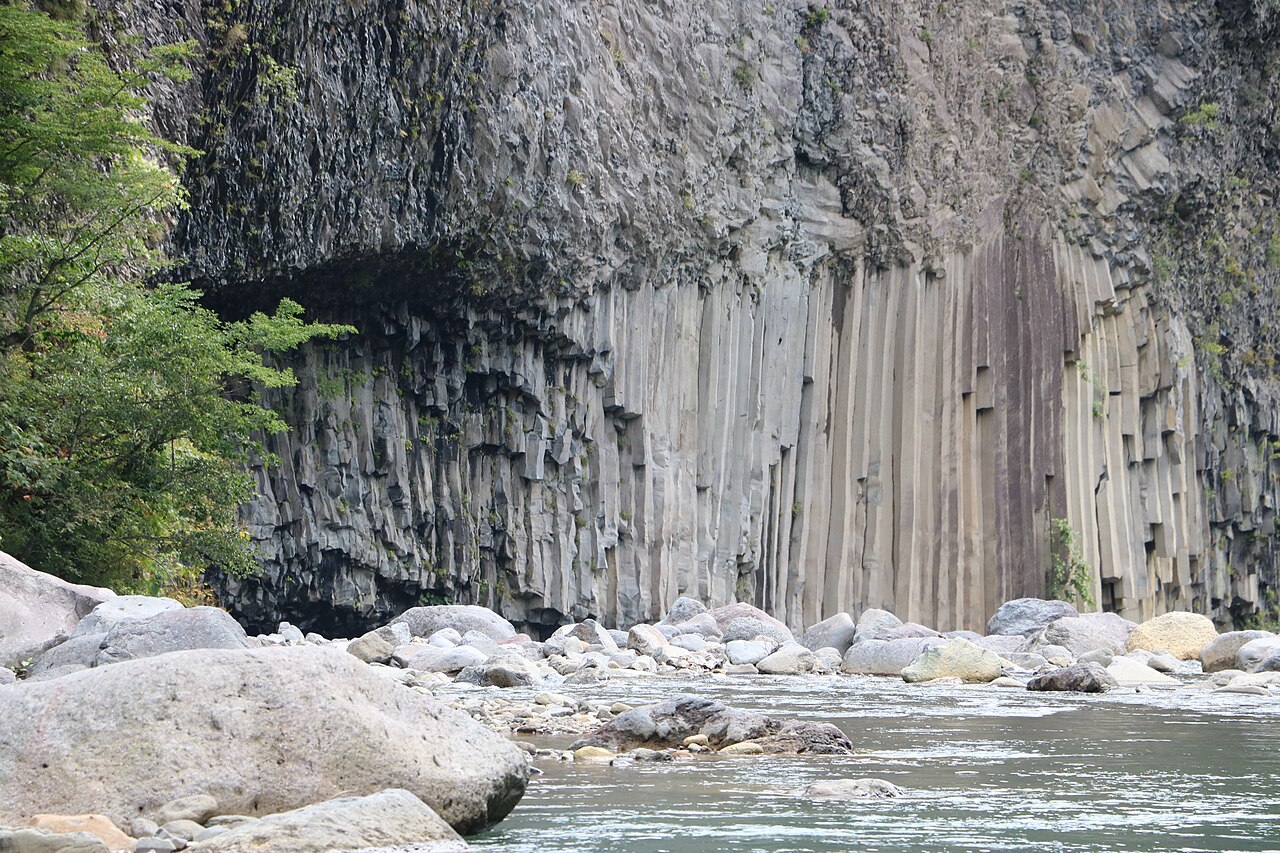 Columnar basalt cliff on a Tajima-coast river near Toyooka